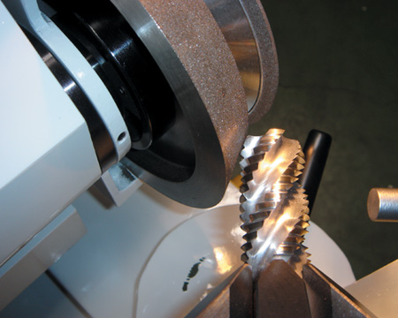 Grinding screw tap bit by hand